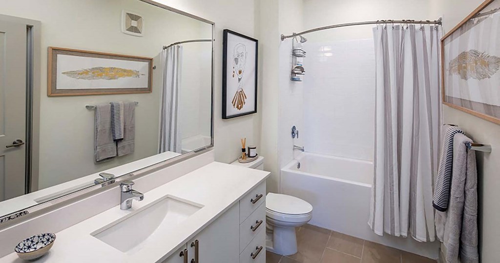 a bathroom with a sink toilet and bathtub at Canopy at Ginter Park Apartments, Richmond, VA, 23227