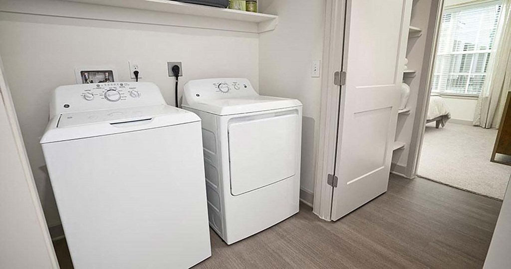 a white washer and dryer in a room