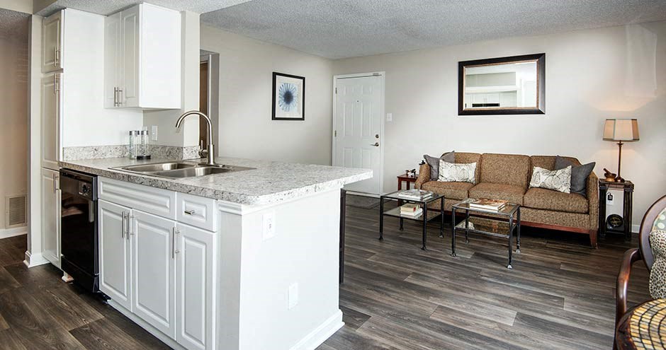 a kitchen that has a sink and a stove in it at Bellemeade Farms Apartments, Leesburg, VA