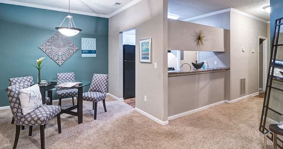 A dining room with a table and chairs A dining room with a table and chairs at Austin Chase Apartments, Macon, GA 31210