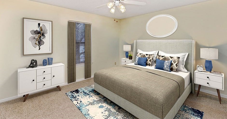 A bedroom with a bed, nightstand, and a dresser with a decorative item on top.