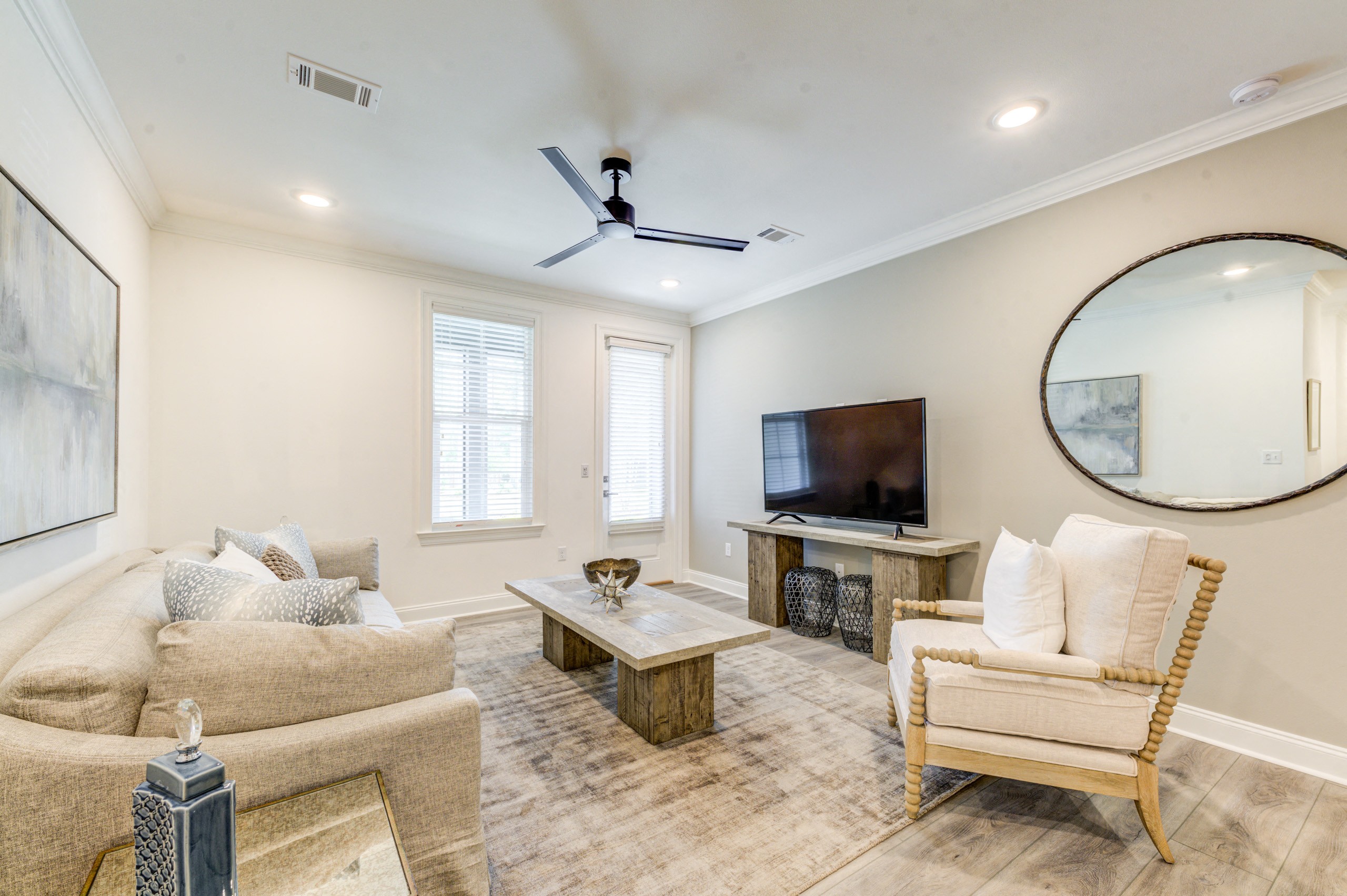 a living room with a couch and a tv