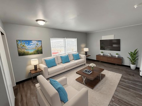 A living room with a white couch, a coffee table, and a painting on the wall.