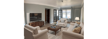 A living room with a brown coffee table and beige couches.