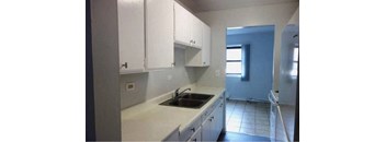 Kitchen with cabinets and sink at The Terraces at Dekalb, Illinois, 60115