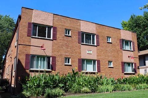 a large brick building with lots of windows