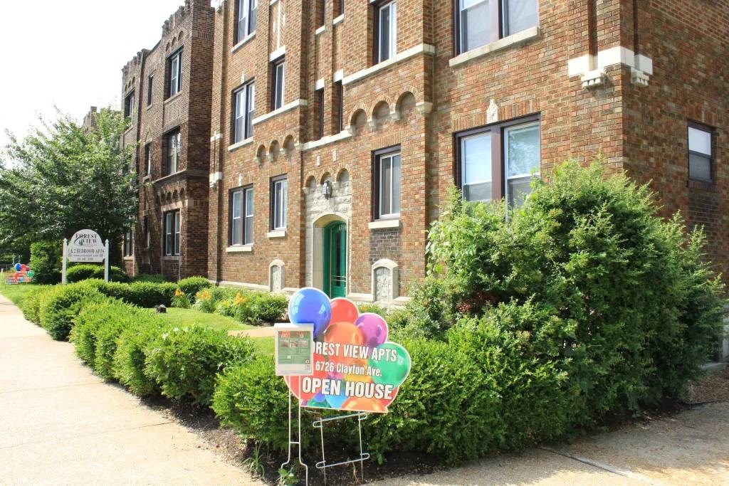 a building with a bunch of balloons in front of it