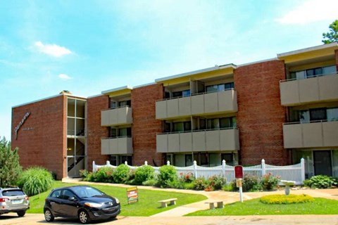 a car is parked in front of a building