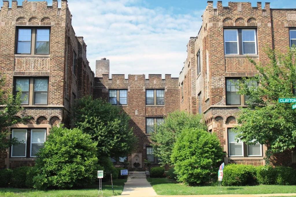 a large brick building with a castle like facade