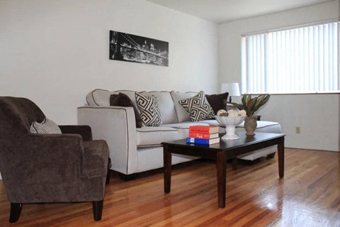 a living room with a couch and a coffee table