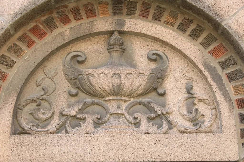 a building with a large decoration on the front of it