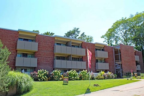 a building with a flag in front of it