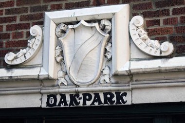a building with a sign that reads dac park