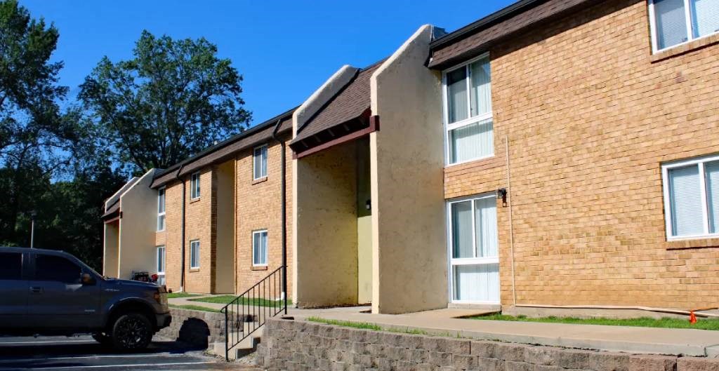 a truck parked in front of a building