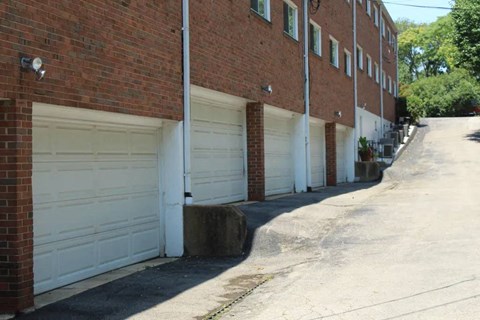 a row of garages on the side of a building
