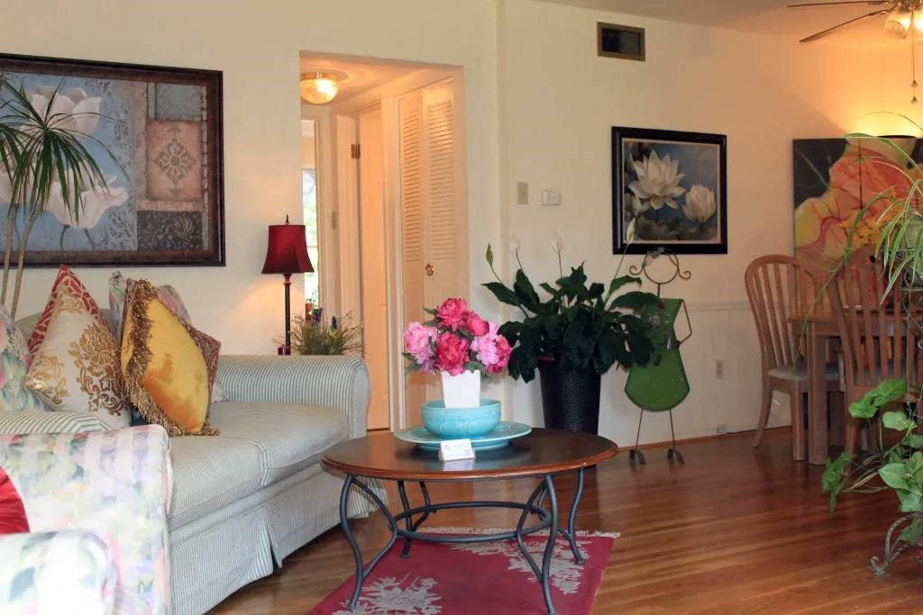 a living room with a couch and a table