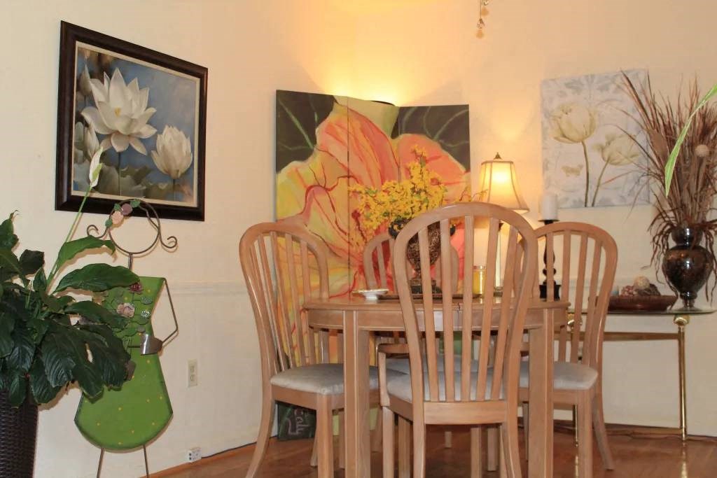 a dining room with a table and chairs