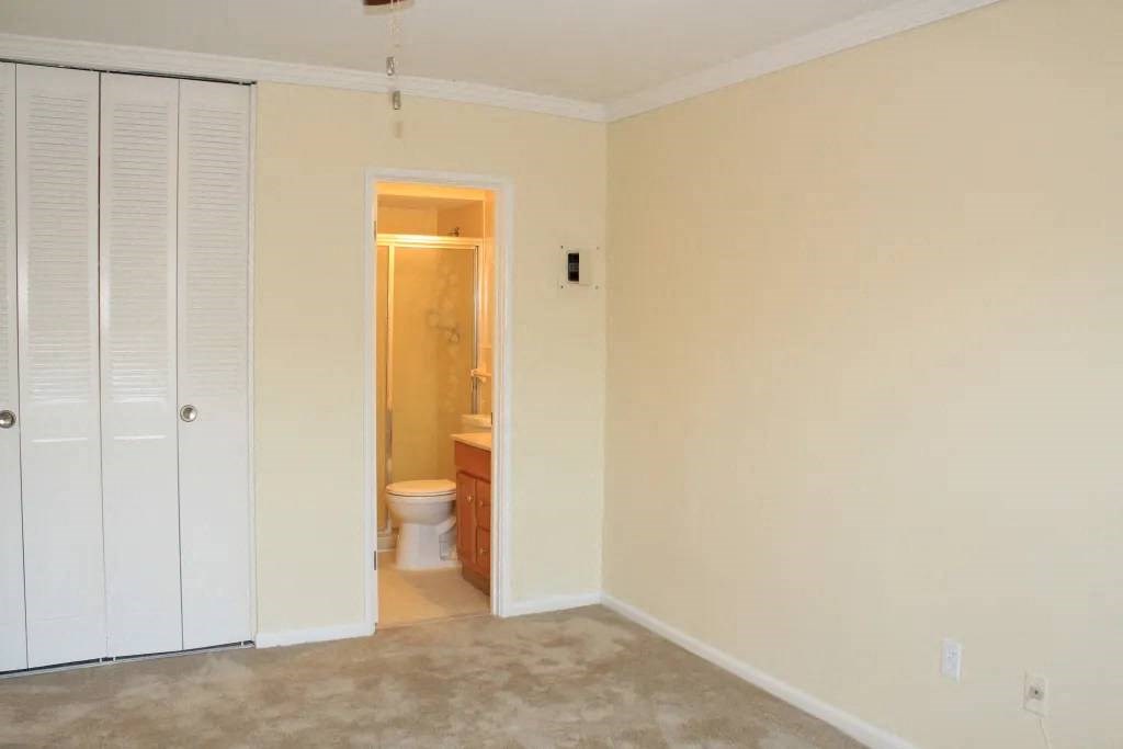 a room with a toilet and a sink in it