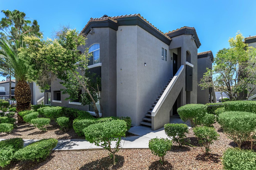 an exterior view of a house with a staircase