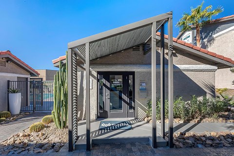 a view of the front of a building with a glass door