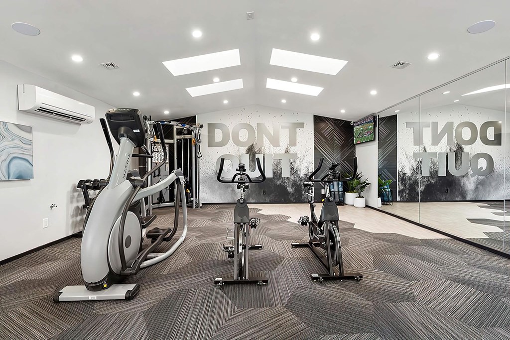 the gym in the owners suite has weights and cardio equipment