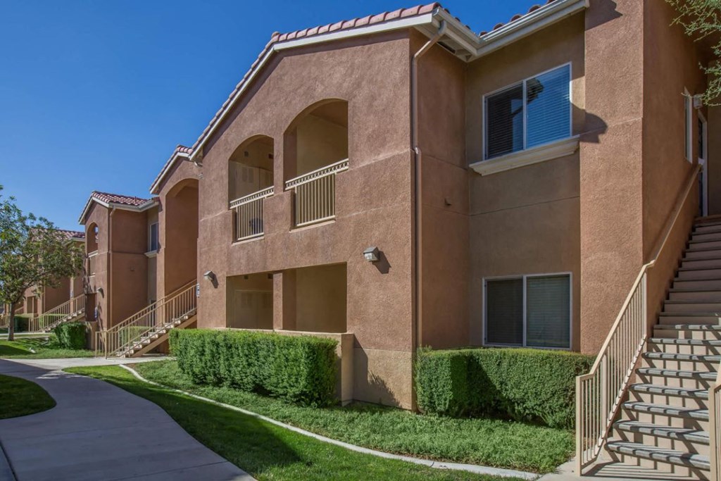 A building with a staircase leading to the entrance.