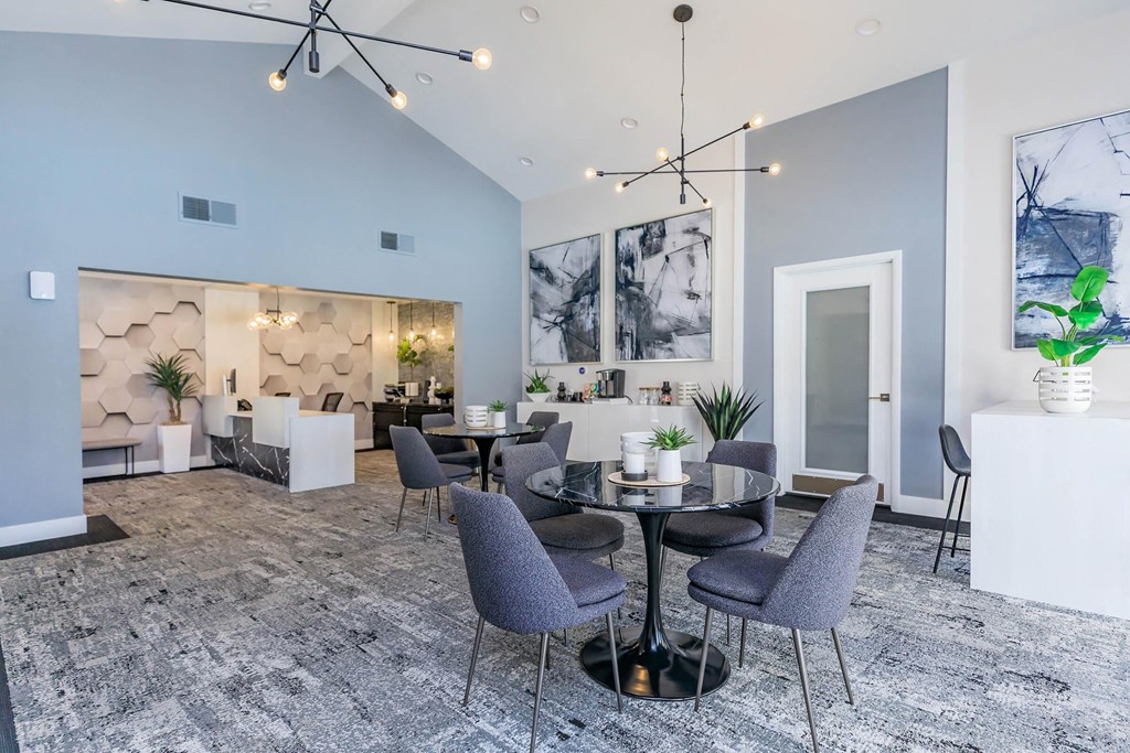 a dining room with a table and chairs