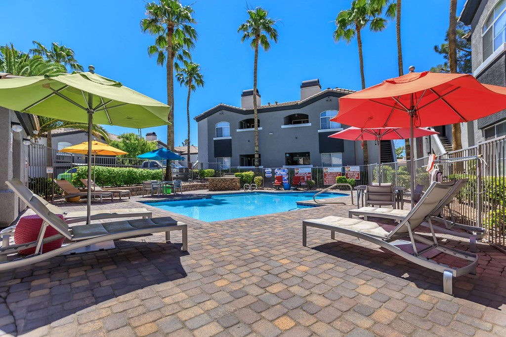 our apartments have a large swimming pool with umbrellas