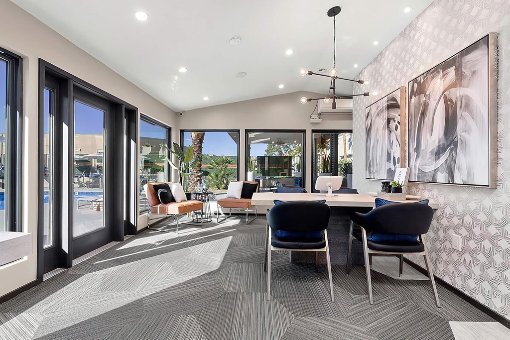 a conference room with a table and chairs