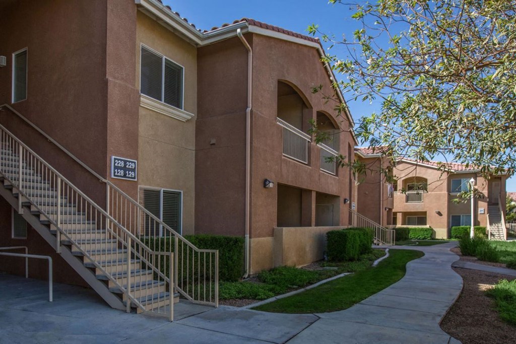 Apartment complex with a sign that says 2428.