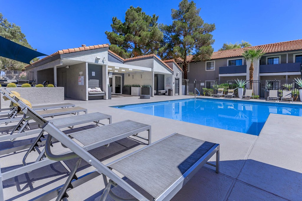 our apartments have a large pool and lounge chairs