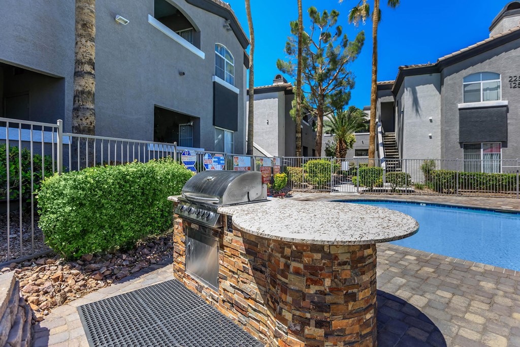 our apartments have a swimming pool with a barbecue pit