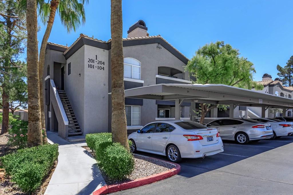 a building with cars parked in front of it