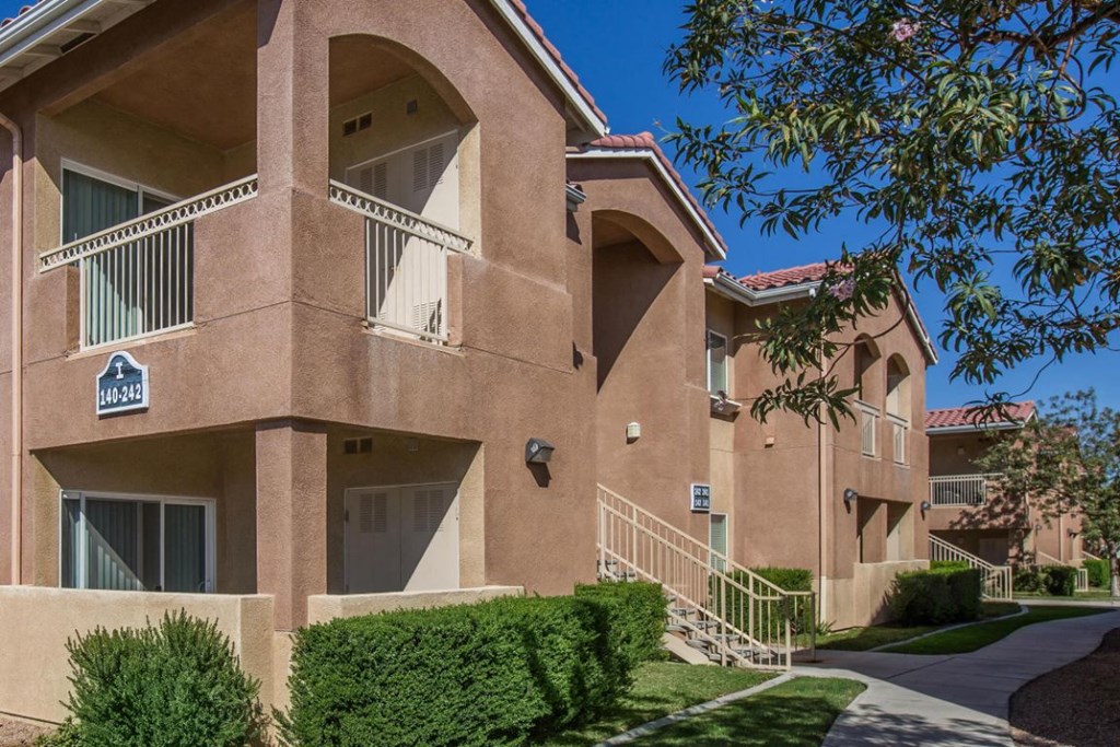 Apartment building with a blue sky in the background.