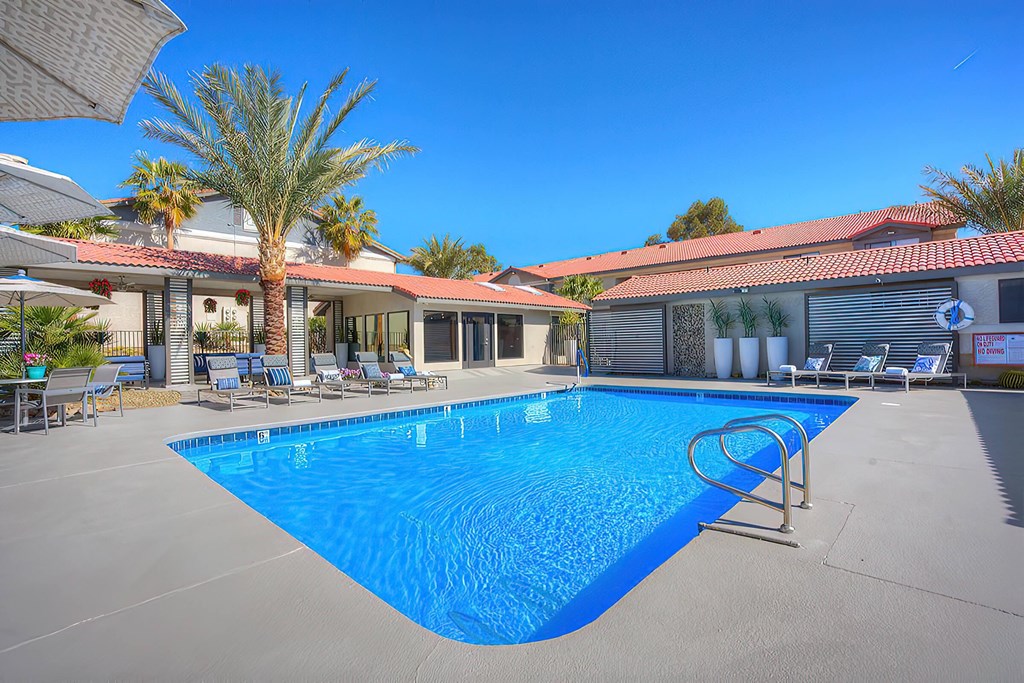 the swimming pool at the clubhouse at villas apartments