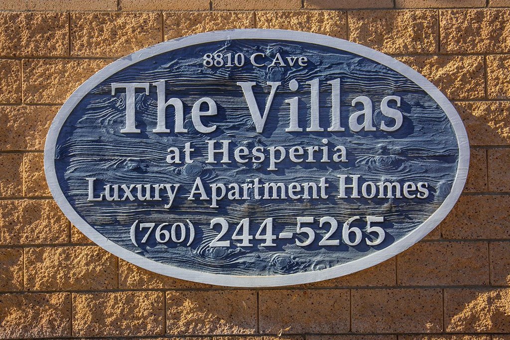 a sign is on the side of a building