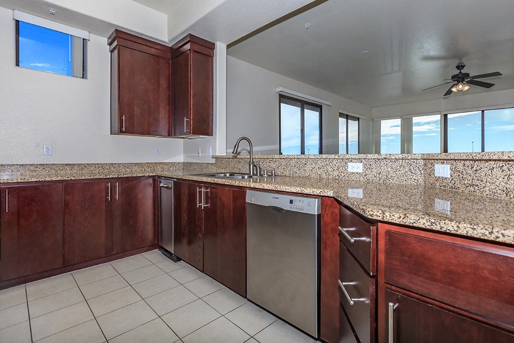 a kitchen with a counter top and a sink