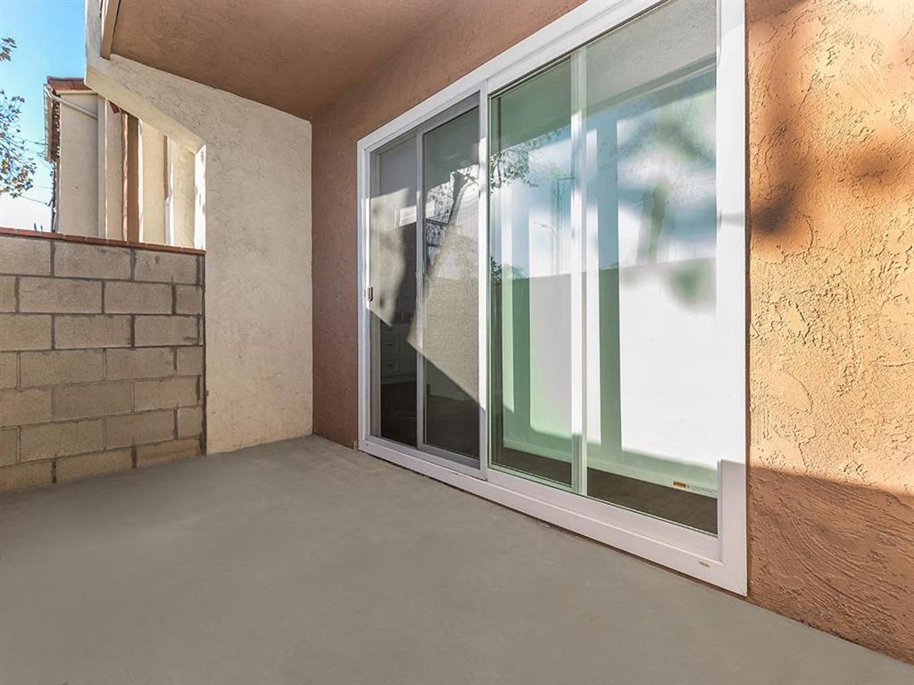 a room with a large window on the side of a building