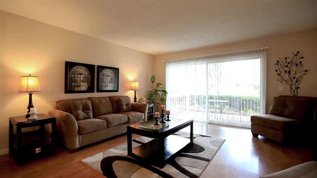 a living room with a couch and a table