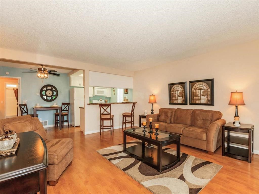 a living room with a couch and a table