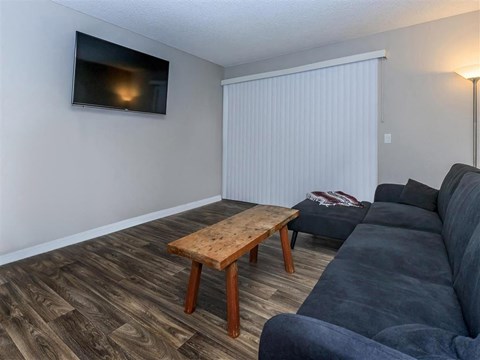 a living room with a couch and a coffee table