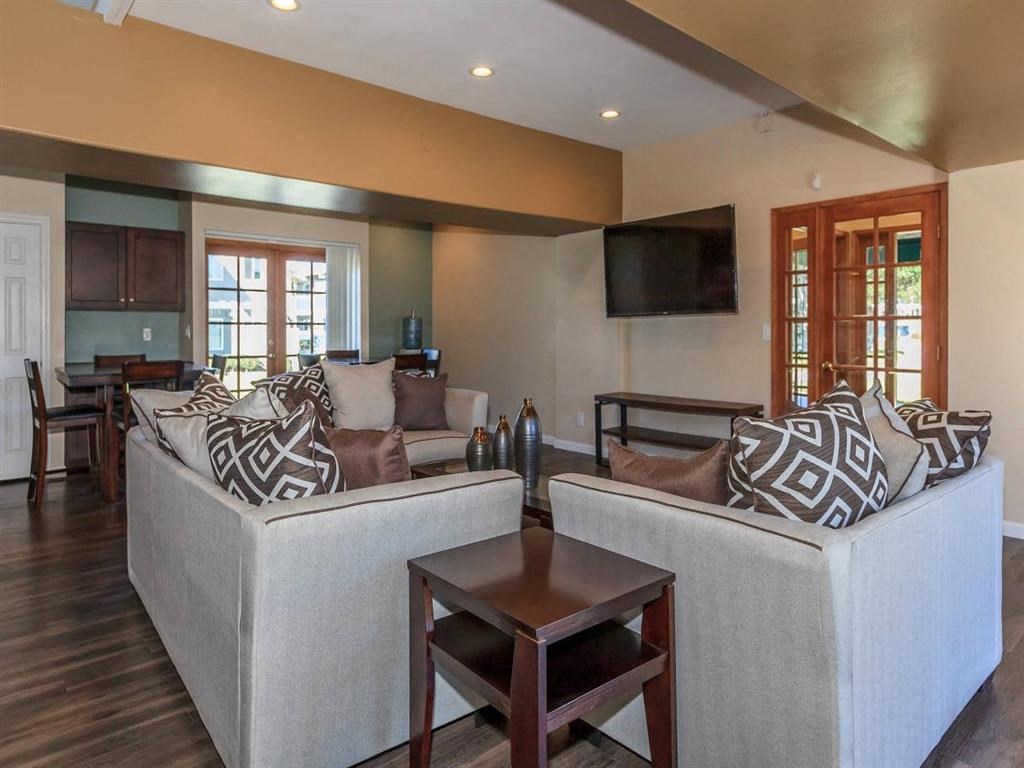 a living room with a couch and a table