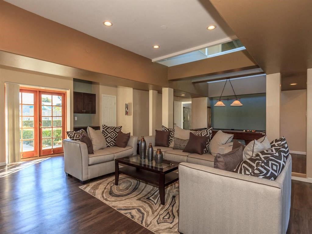 a living room with couches and a table