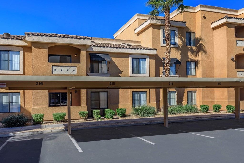 a building with a parking lot in front of it