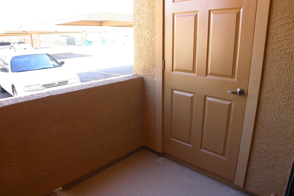 the door to the parking lot is open to the street