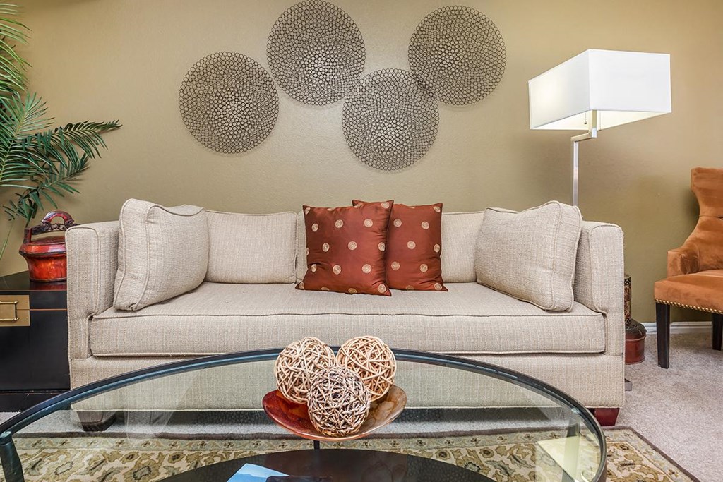 a living room with a couch and a table