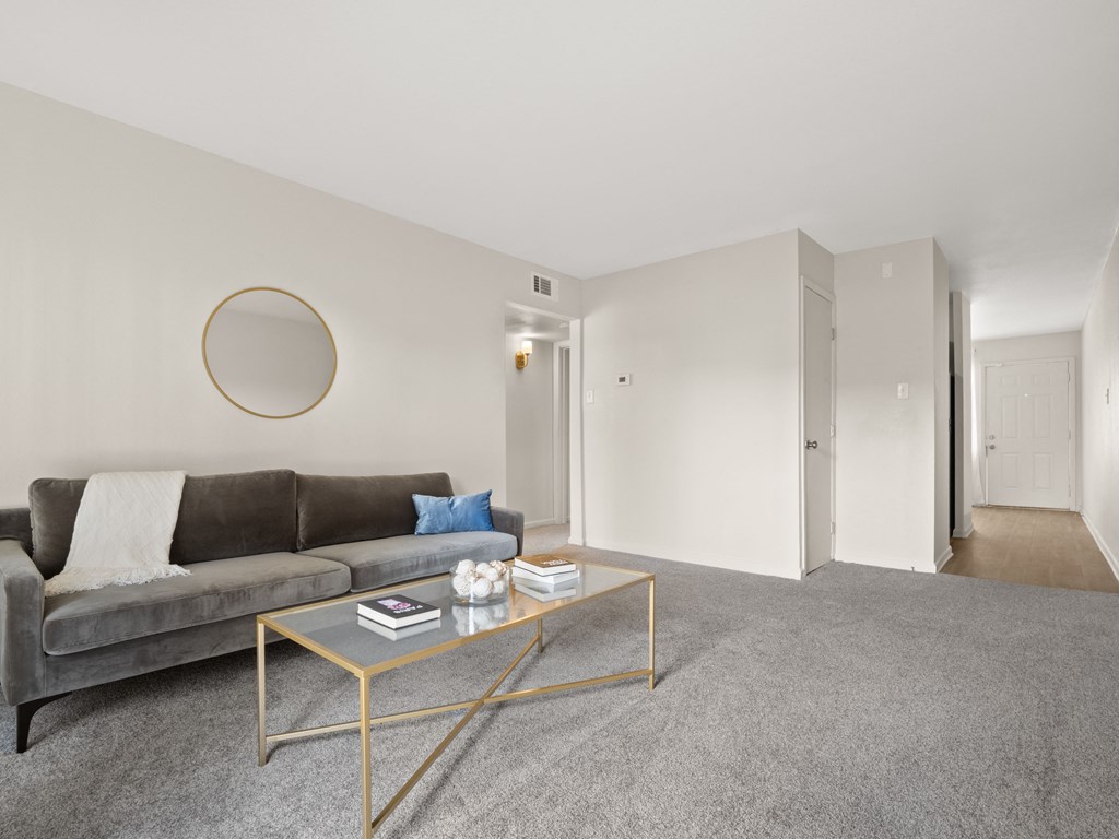 a living room with a couch and a coffee table