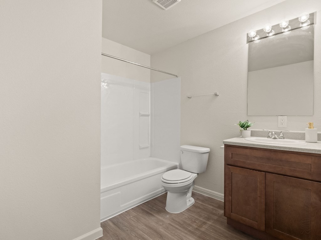 the preserve at ballantyne commons apartment bathroom with toilet sink and tub