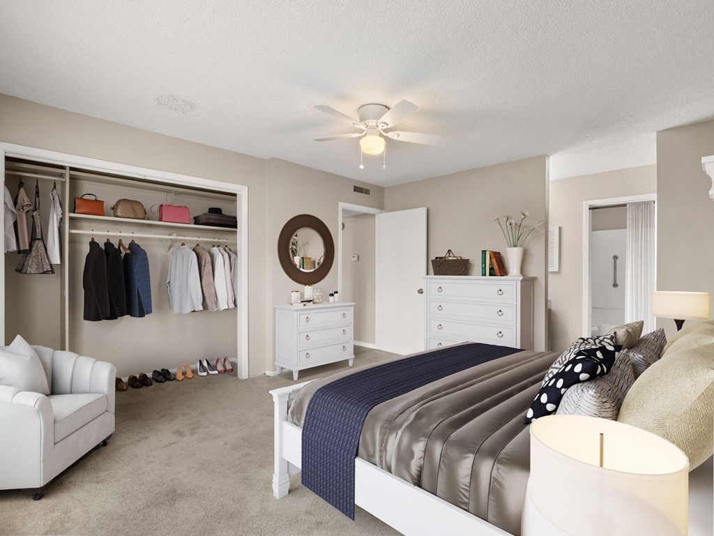 a bedroom with a bed and a closet