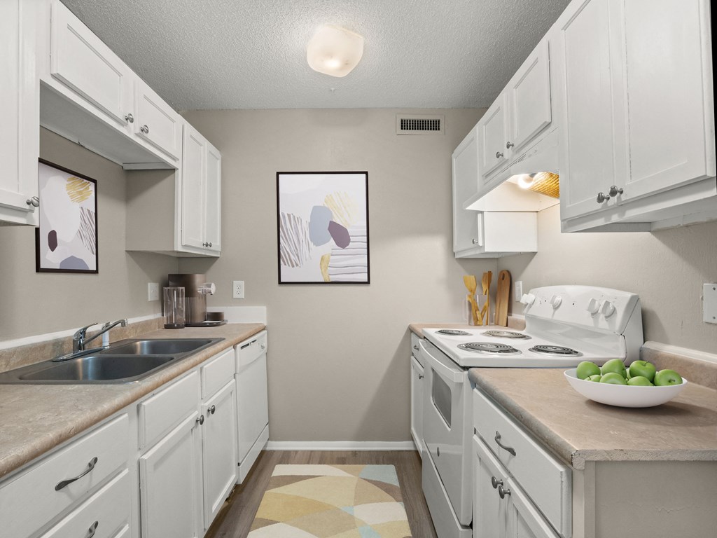 the preserve at ballantyne commons apartments kitchen with white cabinets and counter tops and